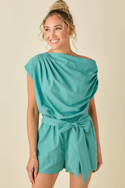 Draped unbalanced drop shoulder romper: AQUA / S